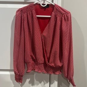 Size small red flower pattern blouse.